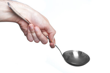 man hand holding soup ladle isolated on white background