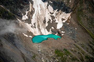 turquoise colored glacier lake in the Bernese Alps © schame87