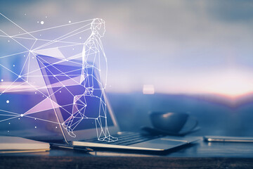 Desktop computer background in office and start up theme hologram drawing. Double exposure. Startup concept.