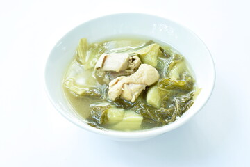 boiled pickled cabbage with chicken meat in clear soup on bowl