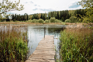 Wooden pier on lake or river shore