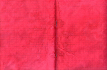 Texture of paper covered with red paint