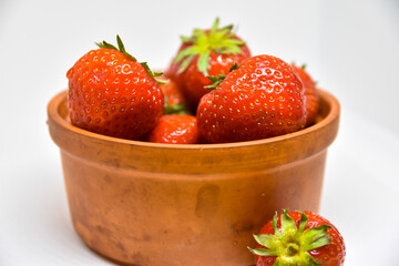 bowl of strawberries with white background