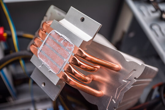 replacement of thermal paste on the processor radiator copper. computer repair and PC improvement. components for the personal computer. computer system upgrade. Uzhhorod. Ukraine - June 22. 2020