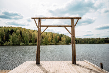 Wooden pier on lake or river shore