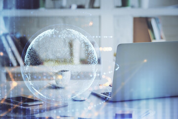 Multi exposure of table with computer and world map hologram. International data network concept.