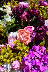 Beautiful multicolored flowers (artificial bouquet)