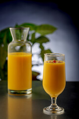 mango smoothie in clear glasses to drink