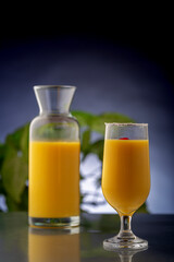 mango smoothie in clear glasses to drink