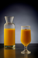 mango smoothie in clear glasses to drink