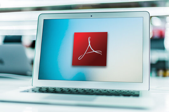 Laptop computer displaying logo of Adobe Acrobat