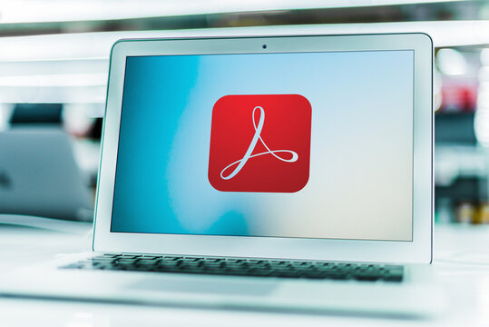 Laptop computer displaying logo of Adobe Acrobat
