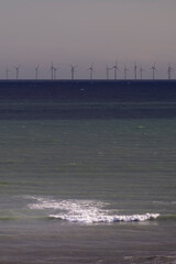 waves at sea and the Brighton wind farm