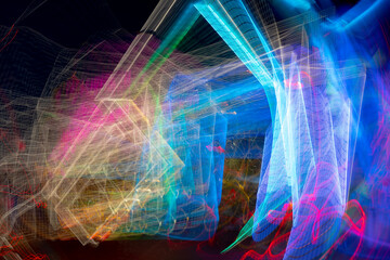 Neon glowing pink and blue lines. Abstract futuristic background.