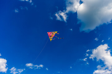 Kite in the sky with clouds