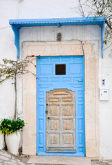 Fototapeta na wymiar Traditional old painted door in Sidi Bou Said, Tunisia.