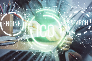 Cryptocurrency hologram over woman's hands writing background. Concept of blockchain. Multi exposure