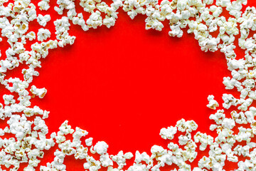 Popcorn mockup on red background top view copy space