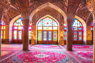 Famous pink mosque decorated with mosaic tiles and religious calligraphic scripts from Persian...