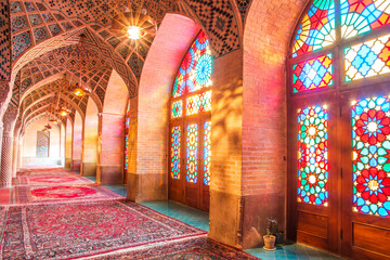 Famous pink mosque decorated with mosaic tiles and religious calligraphic scripts from Persian...