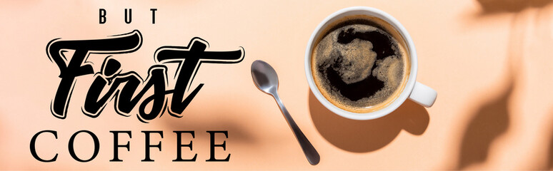 top view of coffee cup and teaspoon on beige with but first coffee lettering, website header