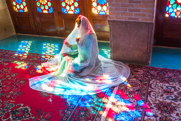 Famous pink mosque decorated with mosaic tiles and religious calligraphic scripts from Persian...