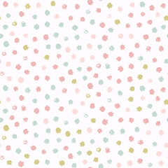 Seamless pastel pattern of abstract textured spots.
