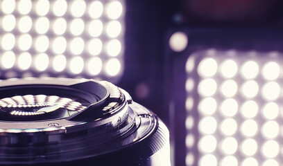 Equipment videographer and photographer. Lenses on the table against the background of bright...