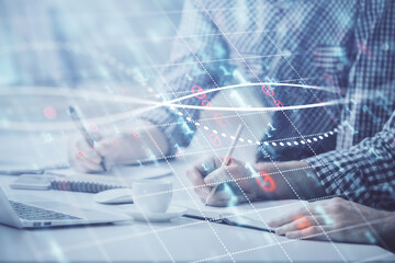 Multi exposure of forex chart with man working on computer on background. Concept of market analysis.