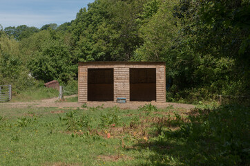 Wooden Horse Shelter in a Paddock on a Farm in Rural Devon, England, UK