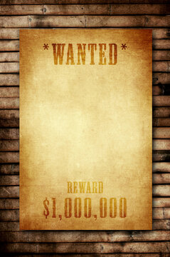 wanted poster on wooden background