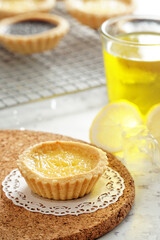 picture of typical Indonesian snacks namely milk pie, precisely from Bali, photographed with fresh lemon ice pampering your mouth and tongue, really a picture that attracts the eye.