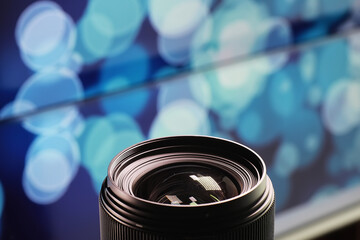 Equipment videographer and photographer. Lenses on the table against the background of bright...