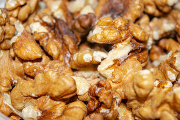 Peeled walnuts close-up. Surface texture. Healthy diet.