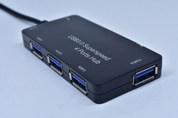 hub 4 port usb 3.0 superspeed black 5 volt power with white background