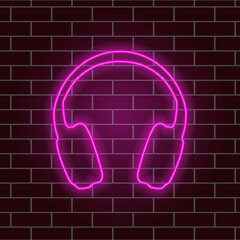 Glowing neon headphones. Pink light. Linear sign. Vector illustration.