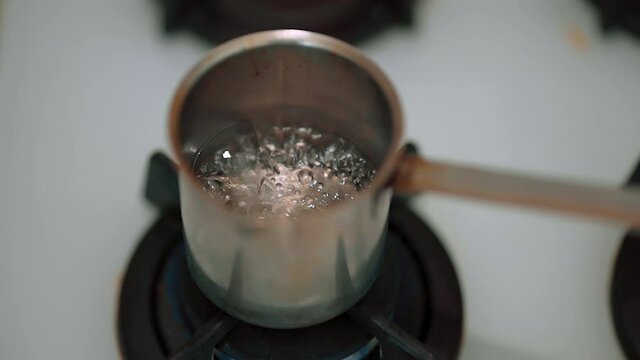 Water boiling on the stove