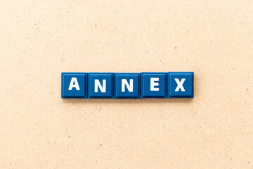 Obraz premium Tile alphabet letter in word annex on wood background