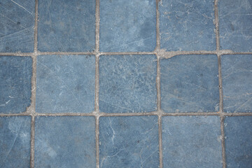 Background of a blue slate in the square form of tiles