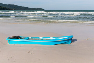 Boat on the beach, saracen bay beach, koh rong samloem island, sihanoukville, Cambodia.