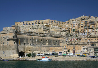 Old houses and fort of Valetta from the Bay