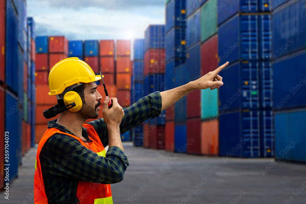 Poster foreman is controlling container loading in import-export business.