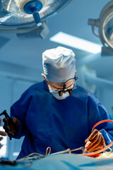 Surgical room in hospital with robotic technology equipment, machine arm surgeon in futuristic...