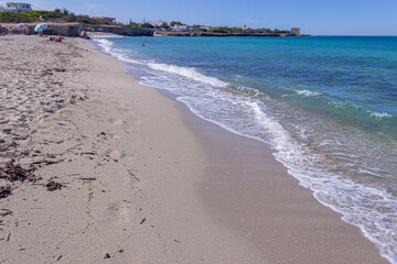 Along the rocky coast of San Foca town in Apulia, there are sandy coves amid caves and sea stacks which come out of the blue sea , ITALY (Salento). 
