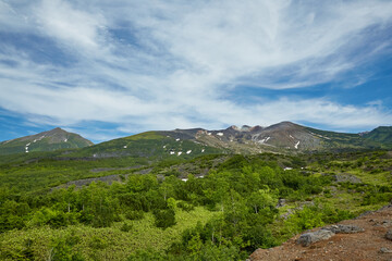 Fototapeta premium Mount Tokachi (十勝岳, Tokachi-dake) in June, Biei, Hokkaido, japan