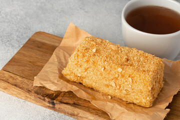 Piece of honey cake on kitchen table