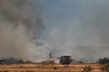 Firefighters arriving at start of destructive daytime Western United States uncontrolled Arizona...