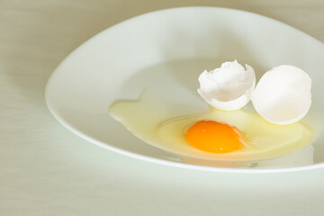 broken egg in a bowl