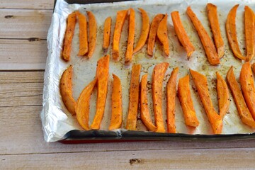 Sweet potato fries on baking sheet