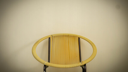 Center view of a straw chair with isolated white background. Selective focus on foregrounds.